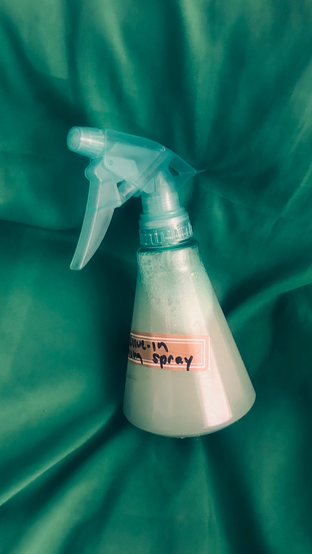 Village leave-in moisturizing spray